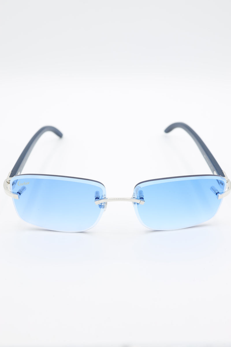 Cartier glasses 2024 blue lenses